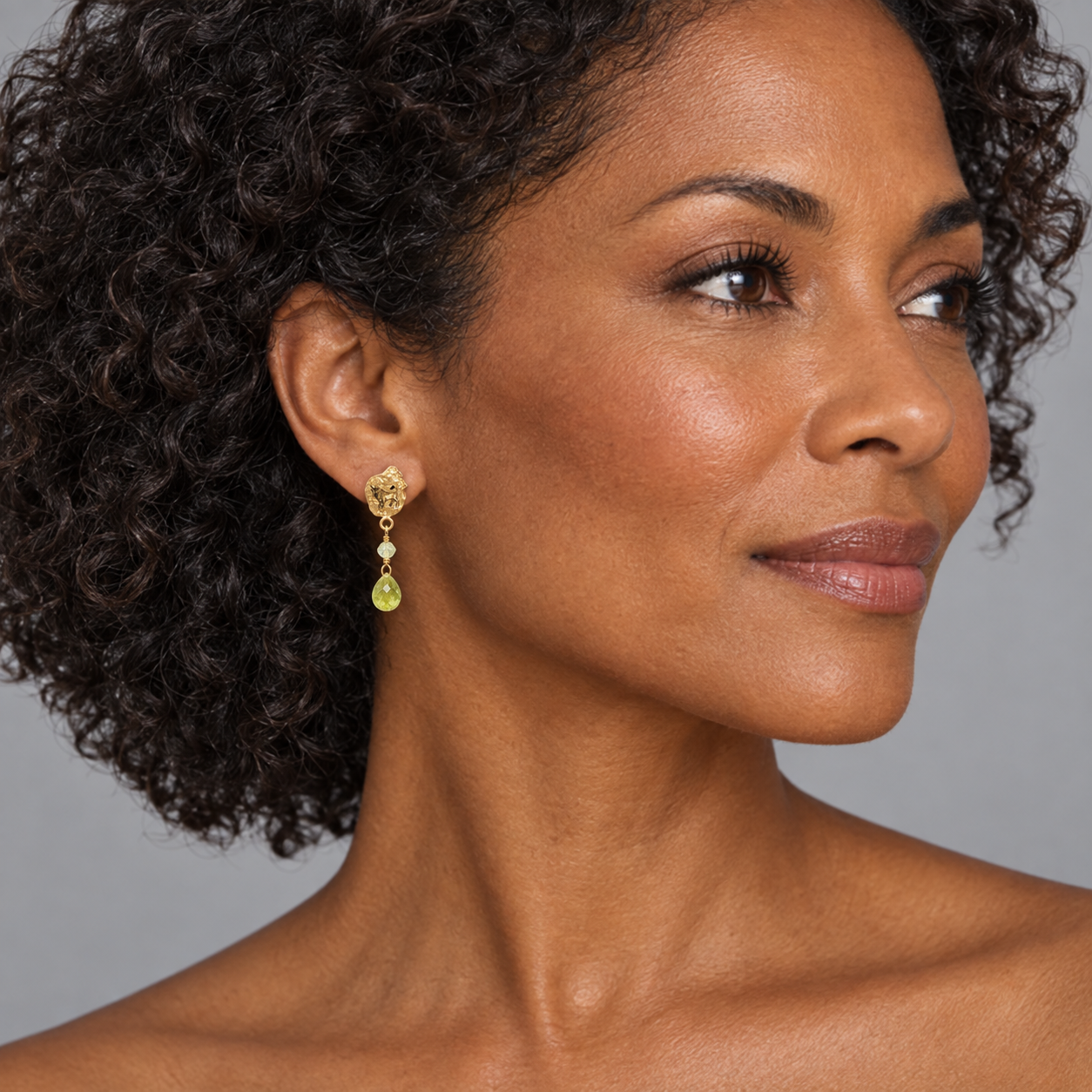 Model wearing the Lesunja Zodiac Taurus Gold Stud Earrings