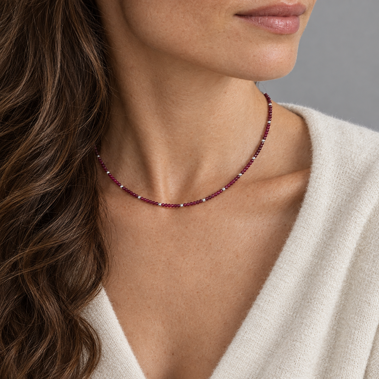 Model wearing the Lesunja Necklace White Gold Ruby