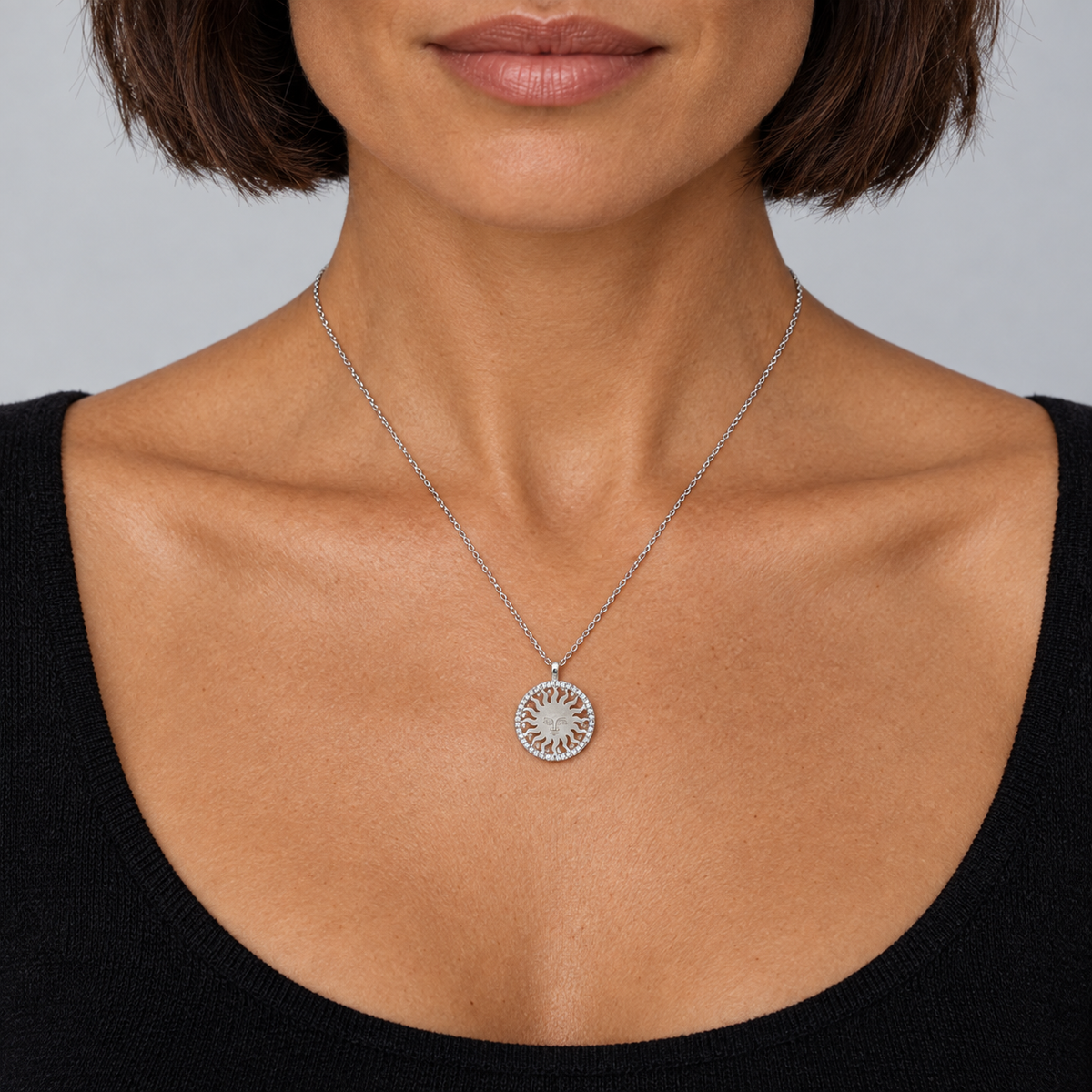 Model wearing the Lesunja St. Moritz Sun Necklace Small White Gold Diamonds