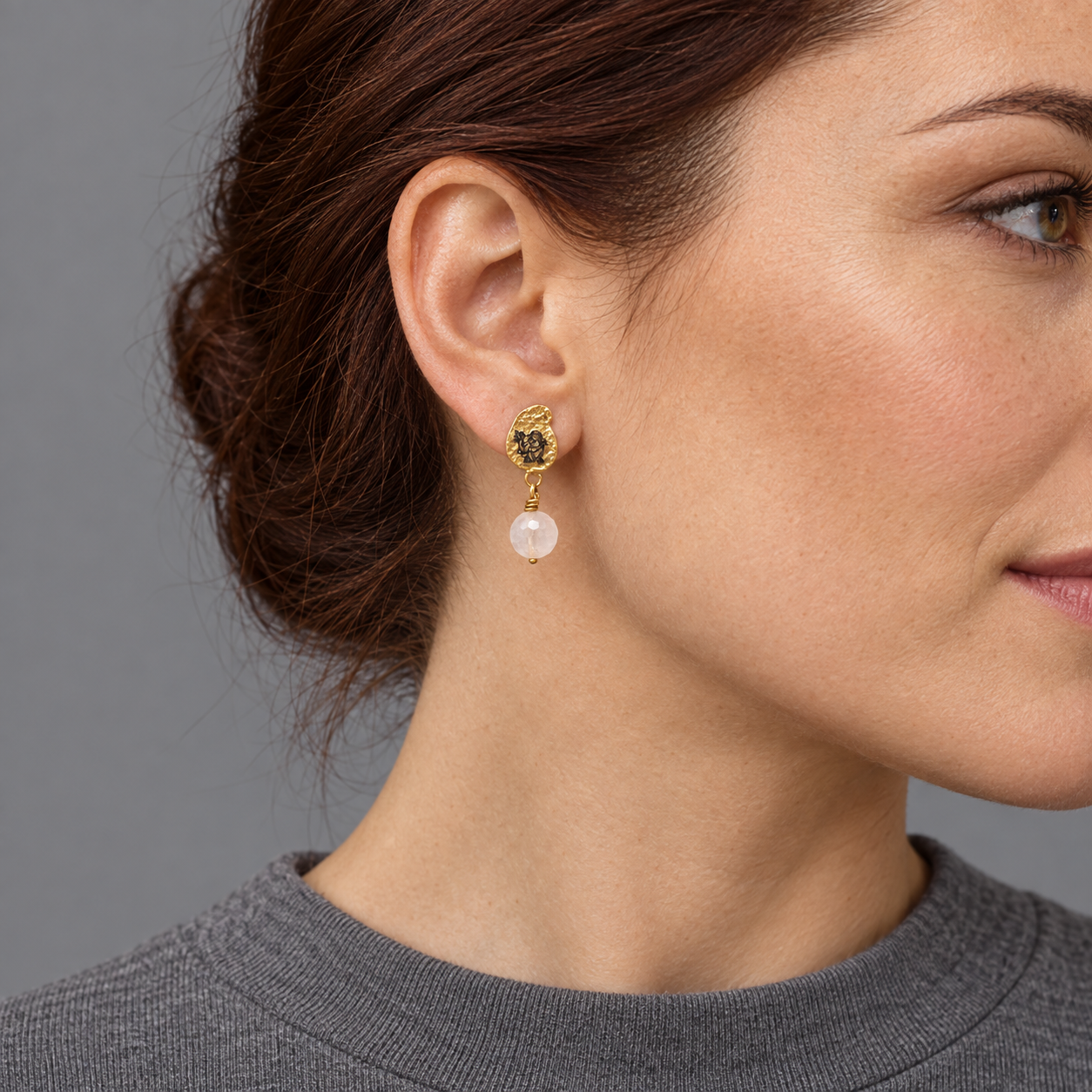 Model wearing the Lesunja Zodiac Virgo Gold Stud Earrings