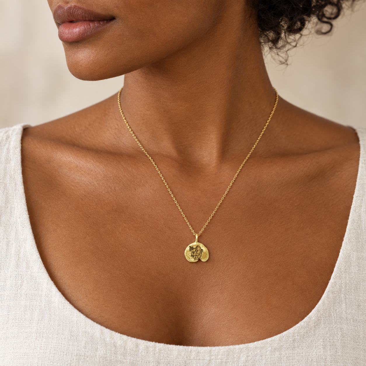 Model wearing the Lesunja Zodiac Virgo Yellow Gold Necklace