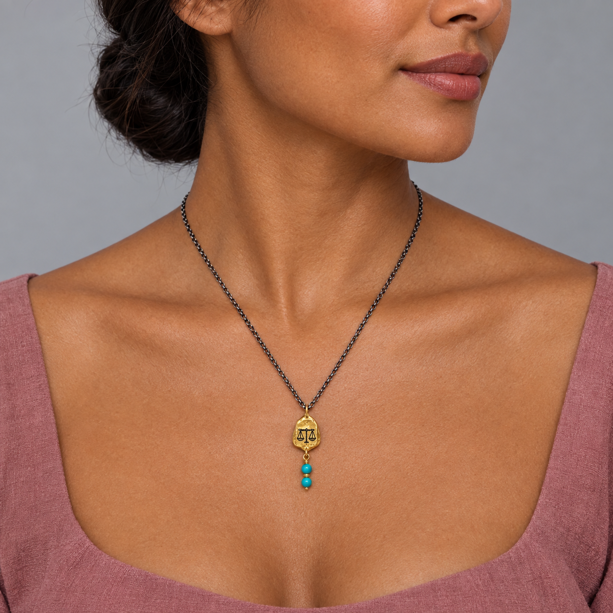 Model wearing the Lesunja Zodiac Libra Silver Necklace Yellow Gold Nugget Turquoise Moonstone