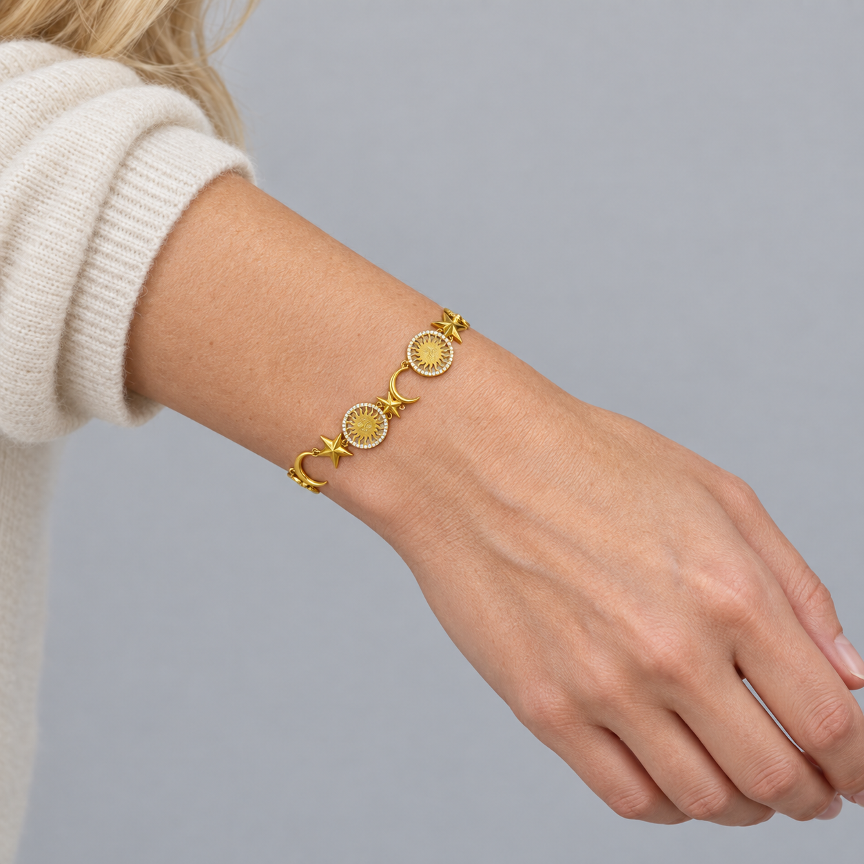 Model wearing the Lesunja St. Moritz Sun Moon and Stars Bracelet