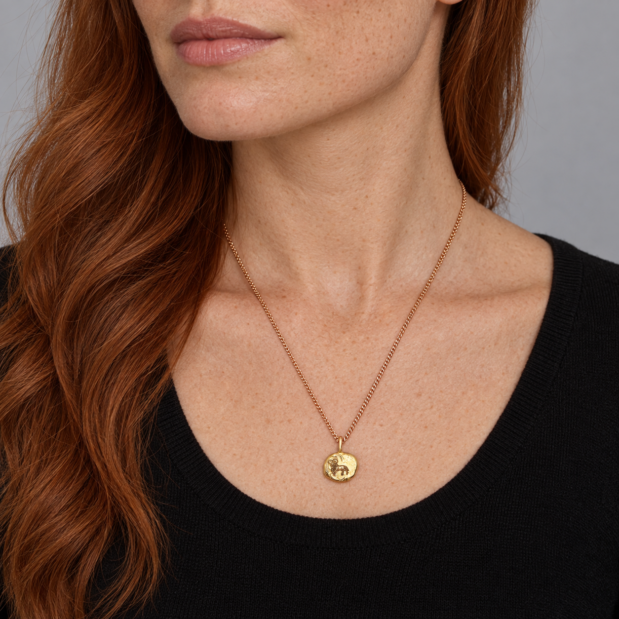 Model wearing the Lesunja Zodiac Aries Necklace