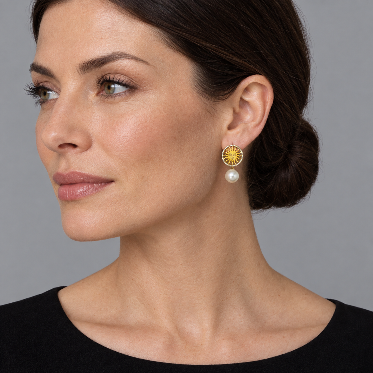 Model wearing the Lesunja St. Moritz Sun Pearl Earrings