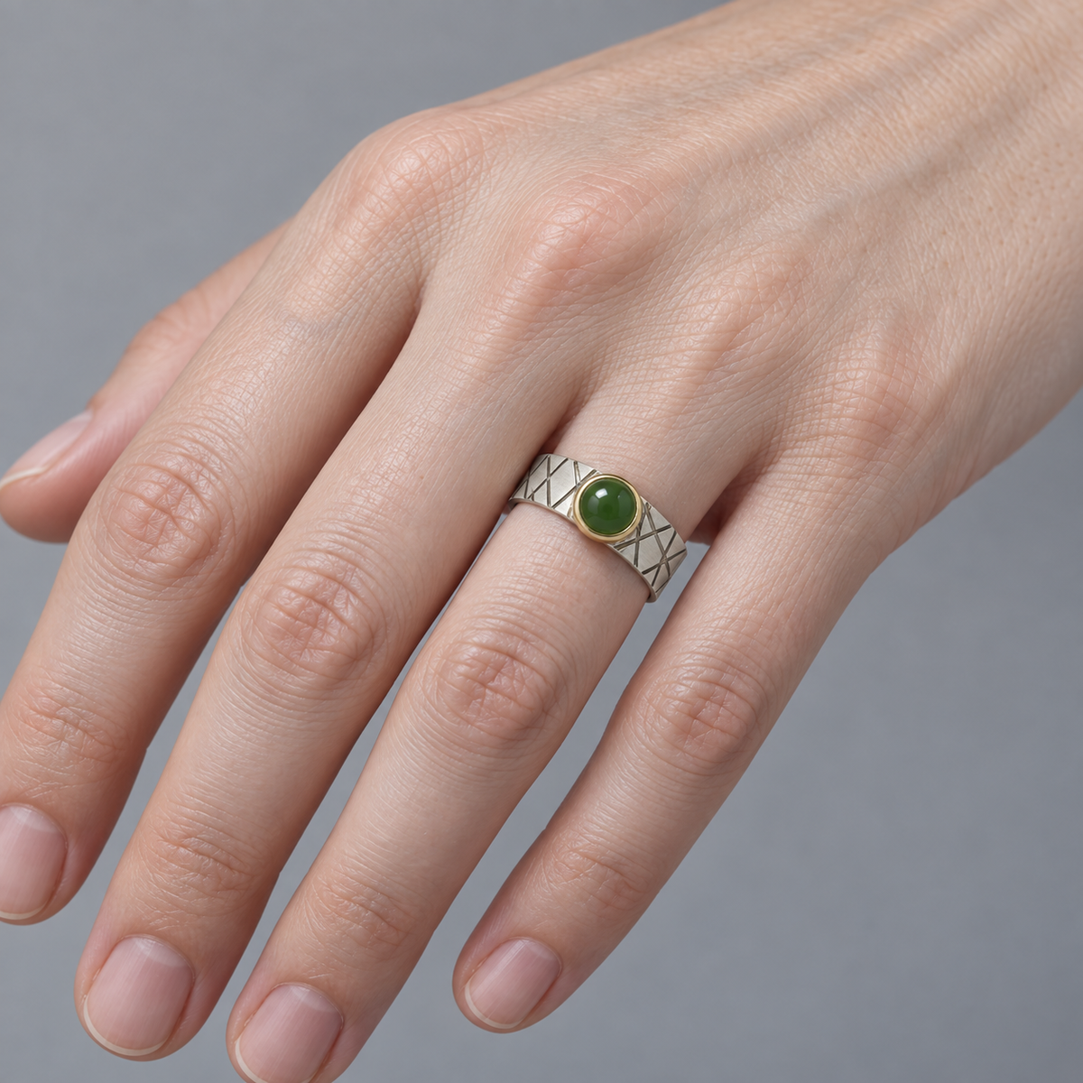 Model wearing the Lesunja Ring Silver Yellow Gold Green Jade