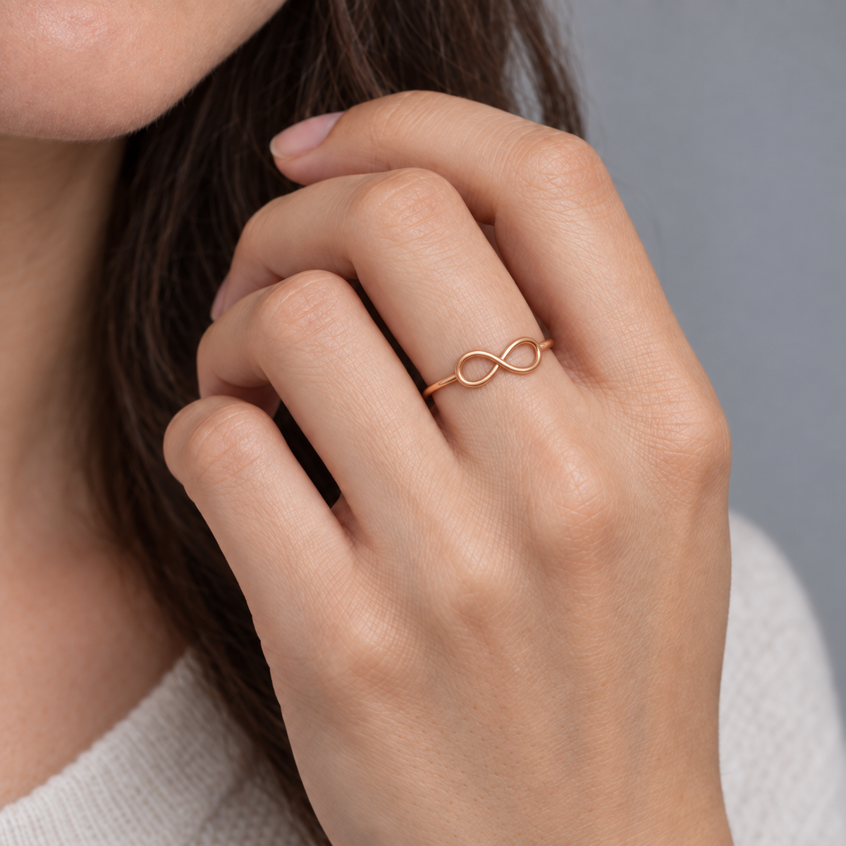 Model wearing the Lesunja Infinity Rose Gold Ring