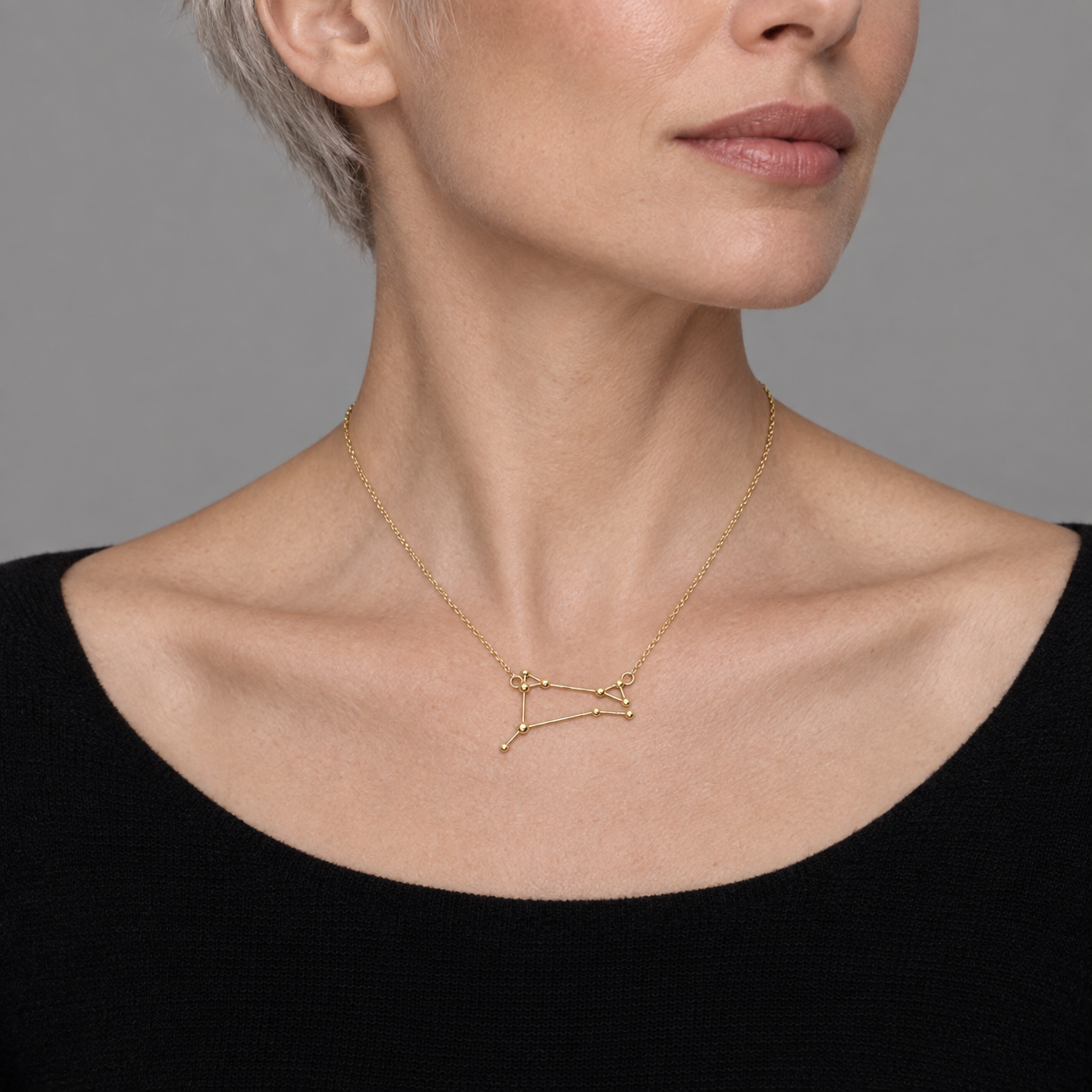Model wearing the Lesunja Zodiac Aries Necklace Yellow Gold