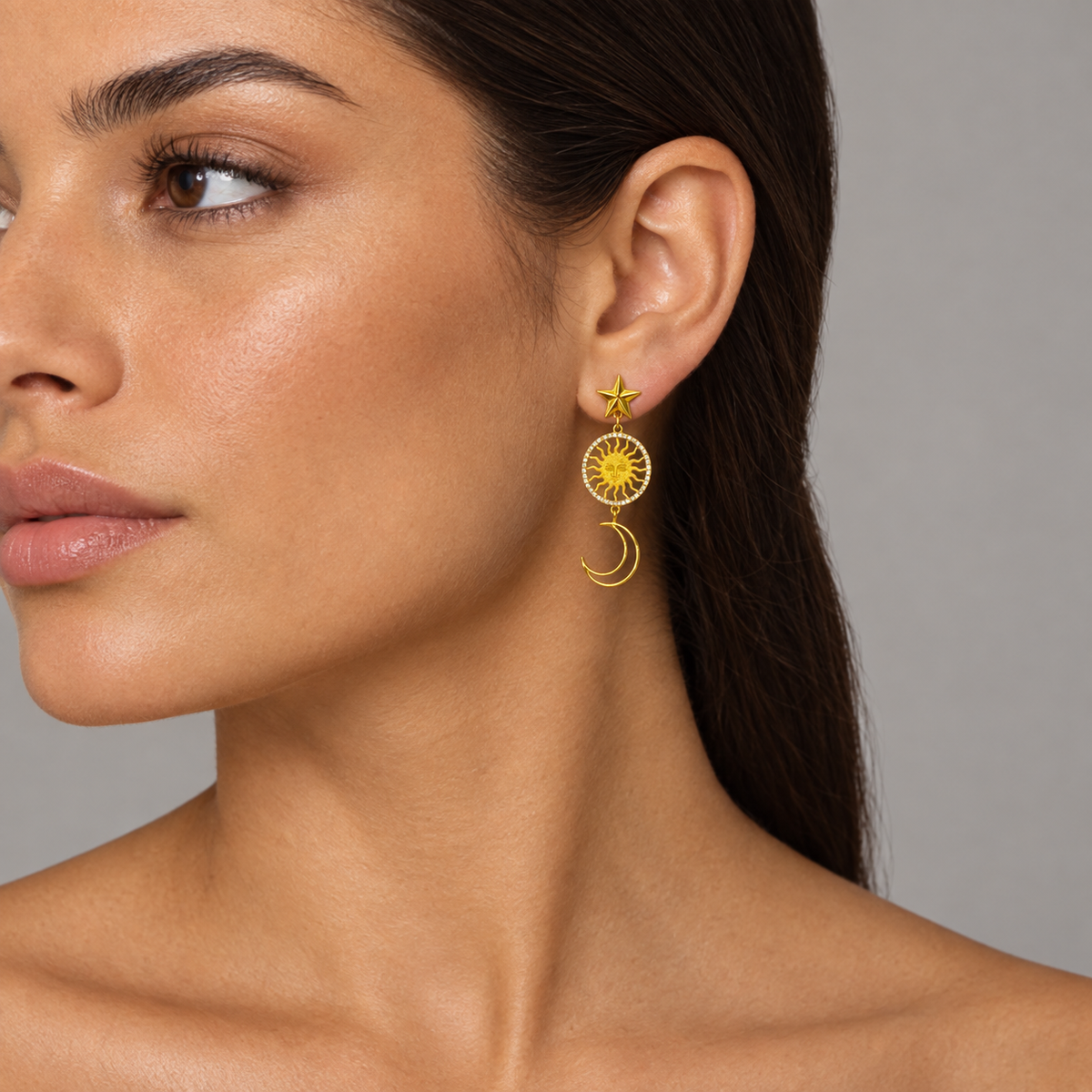 Model wearing the Lesunja St. Moritz Sun Moon and Stars Earrings