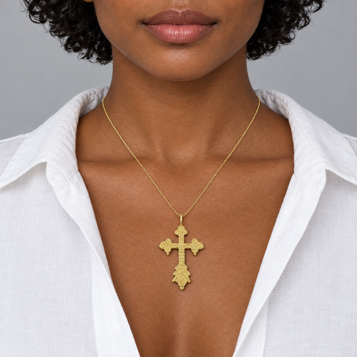 Model wearing the Lesunja Sepia Cross Silver Yellow Gold Plated Pendant