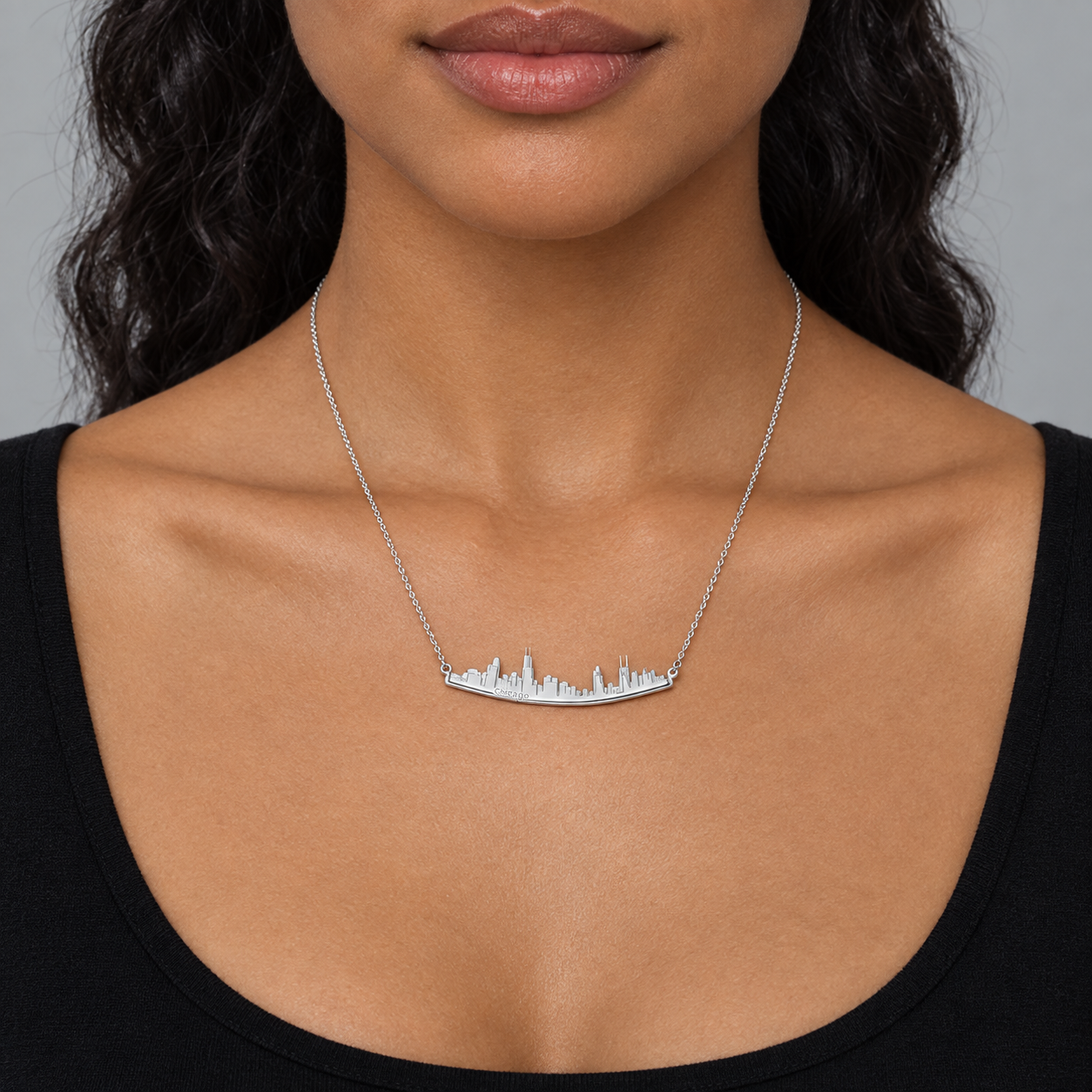 Model wearing the Lesunja Skyline Chicago Silver Necklace