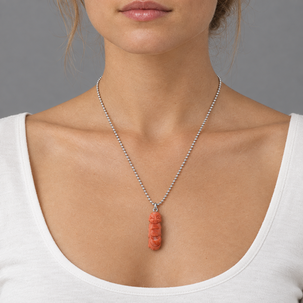 Model wearing the Lesunja Buddha Thissa Koralle Silver Pendant Necklace