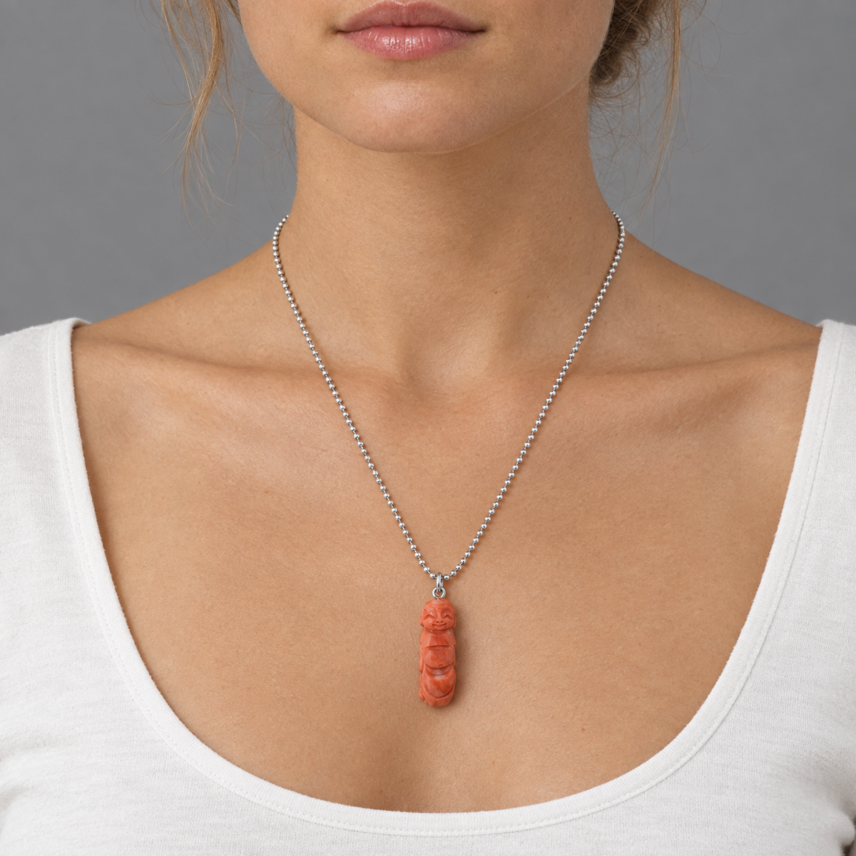 Model wearing the Lesunja Buddha Thissa Koralle Silver Pendant Necklace