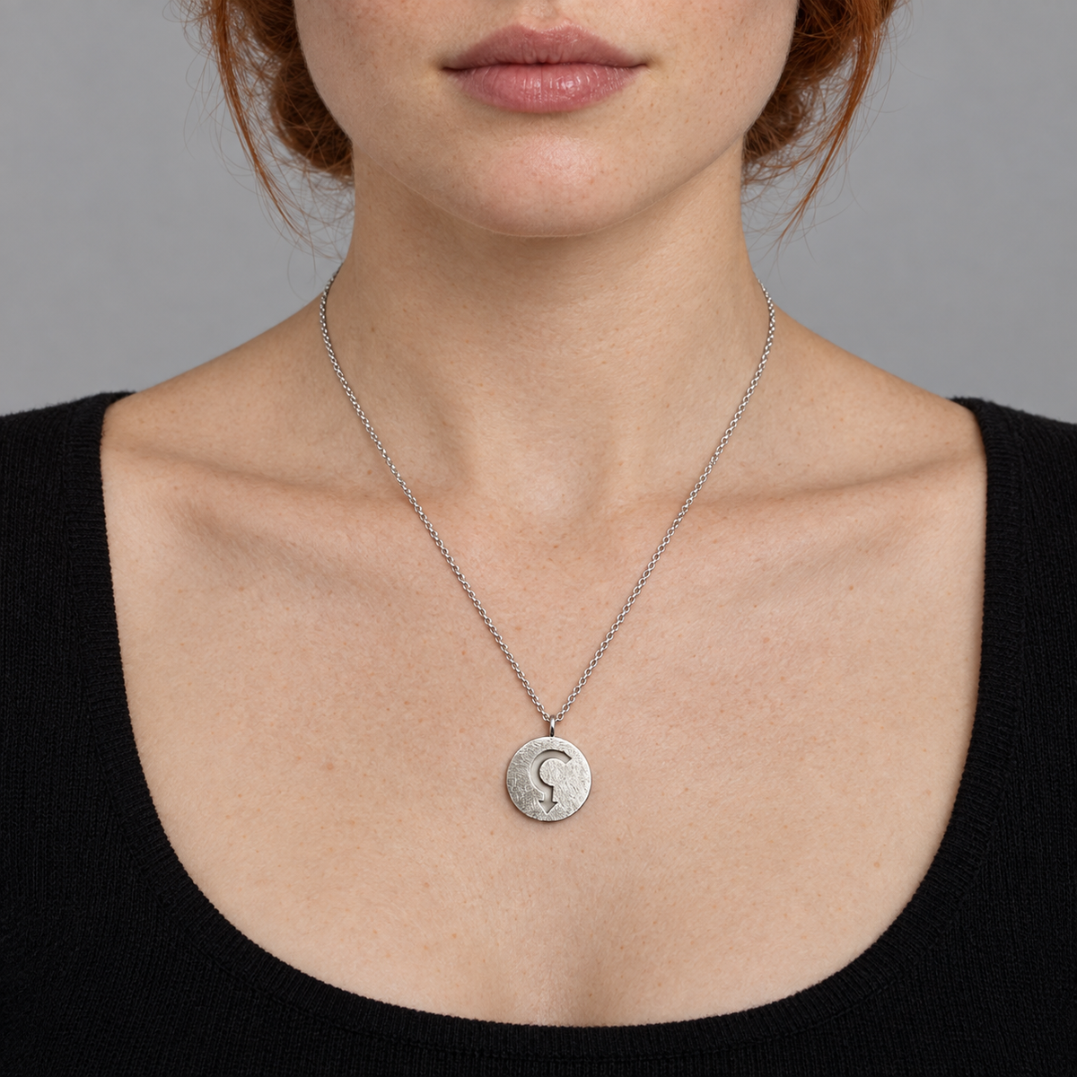 Model wearing the Lesunja Mars Silver Necklace