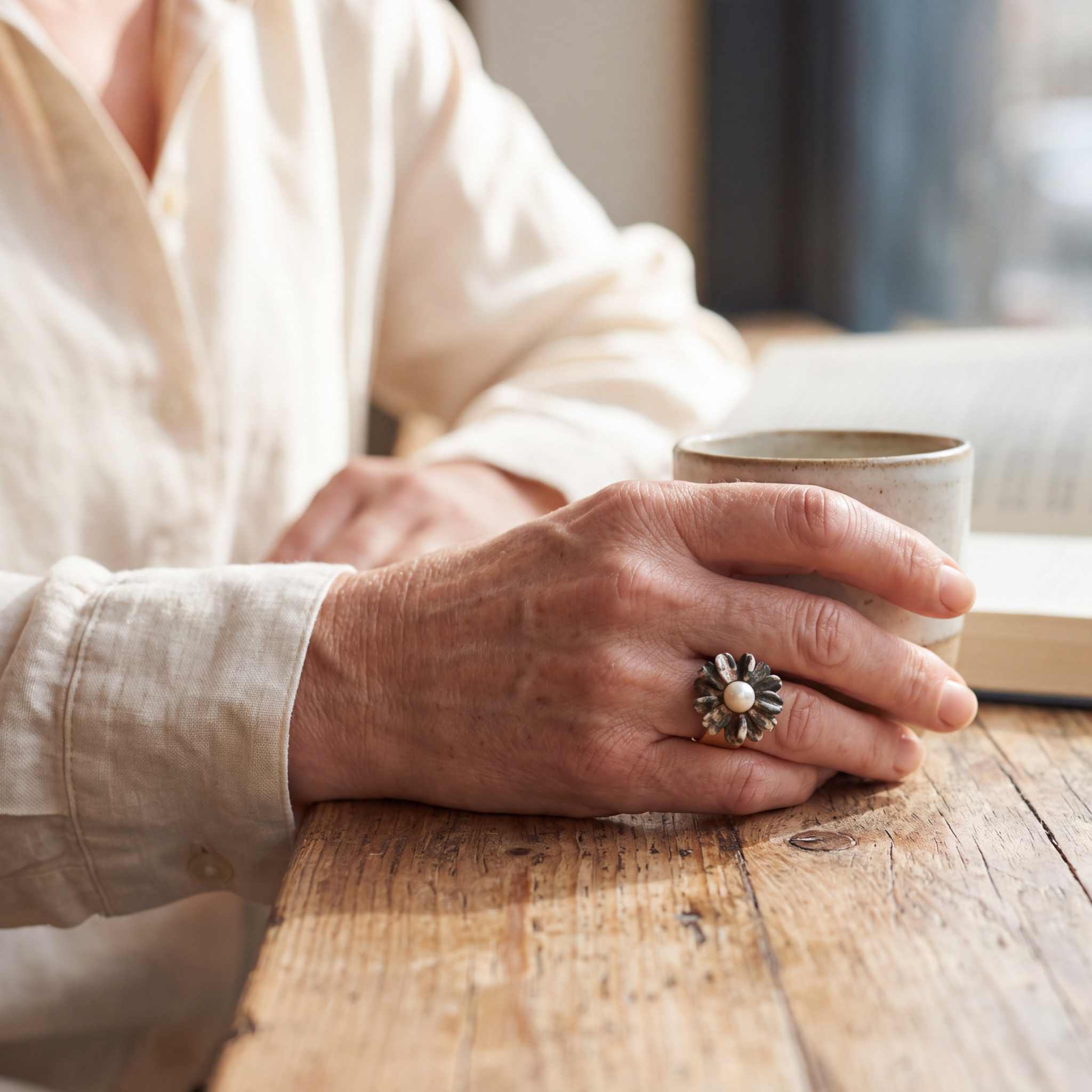 Model wearing the Lesunja Edelweiss Jasper Pearl Yellow Gold Ring