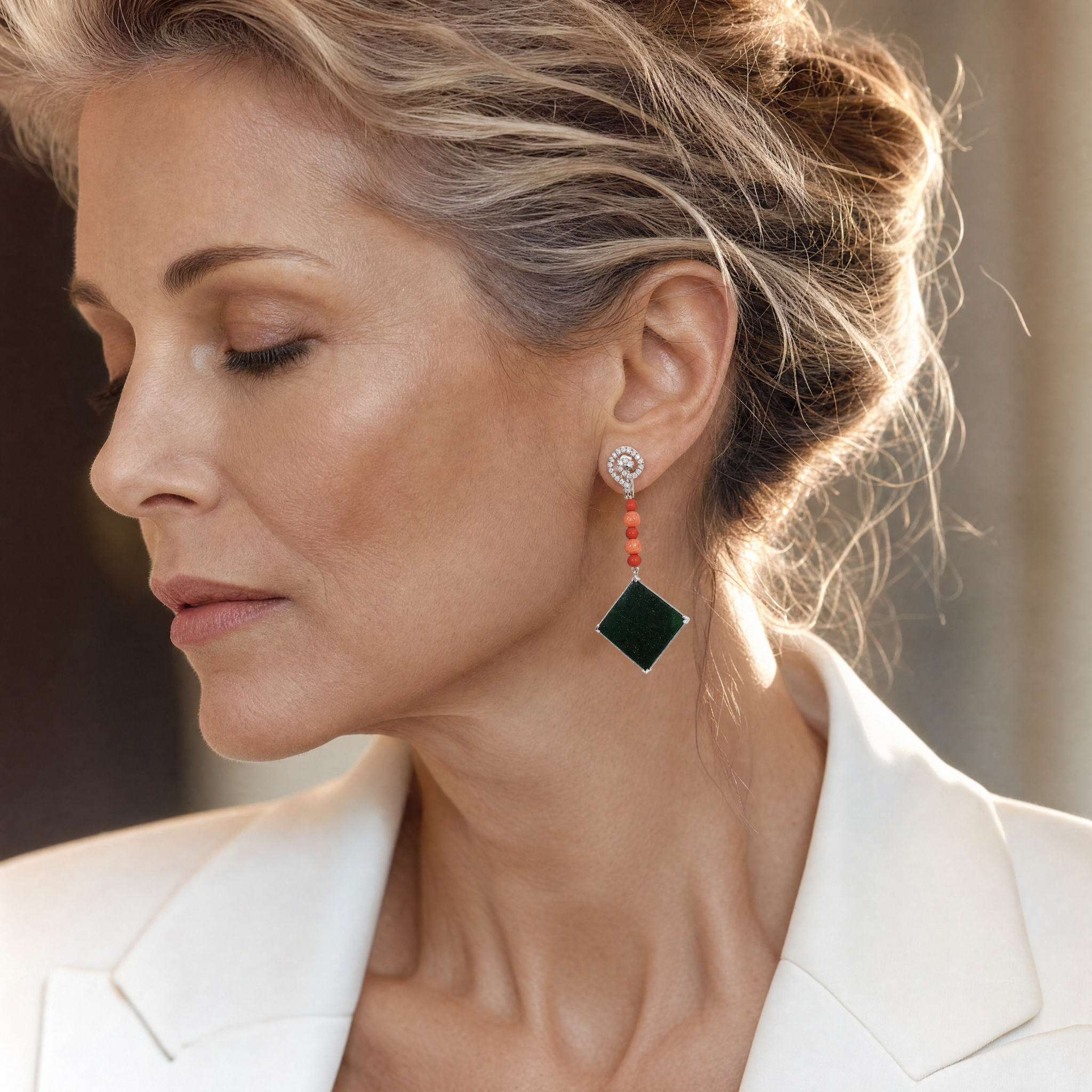 Model wearing the Lesunja Platinum Jade Coral Green Dangle Diamond Earrings