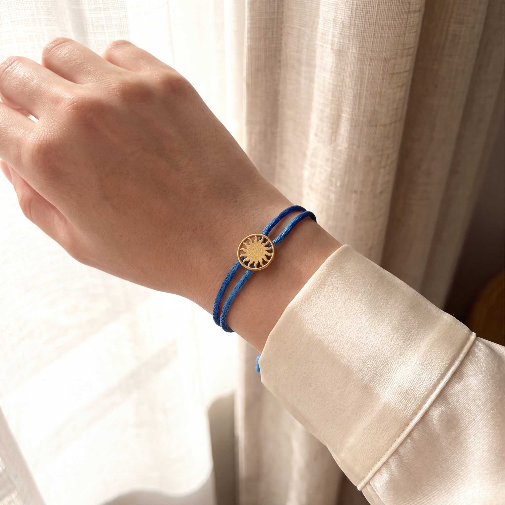Model wearing the Lesunja St. Moritz Sun Bracelet