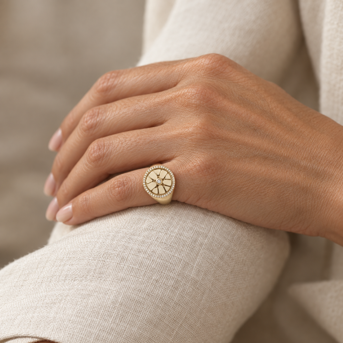 Model wearing the Lesunja Signet Ring 9K Yellow Gold Diamond Halo