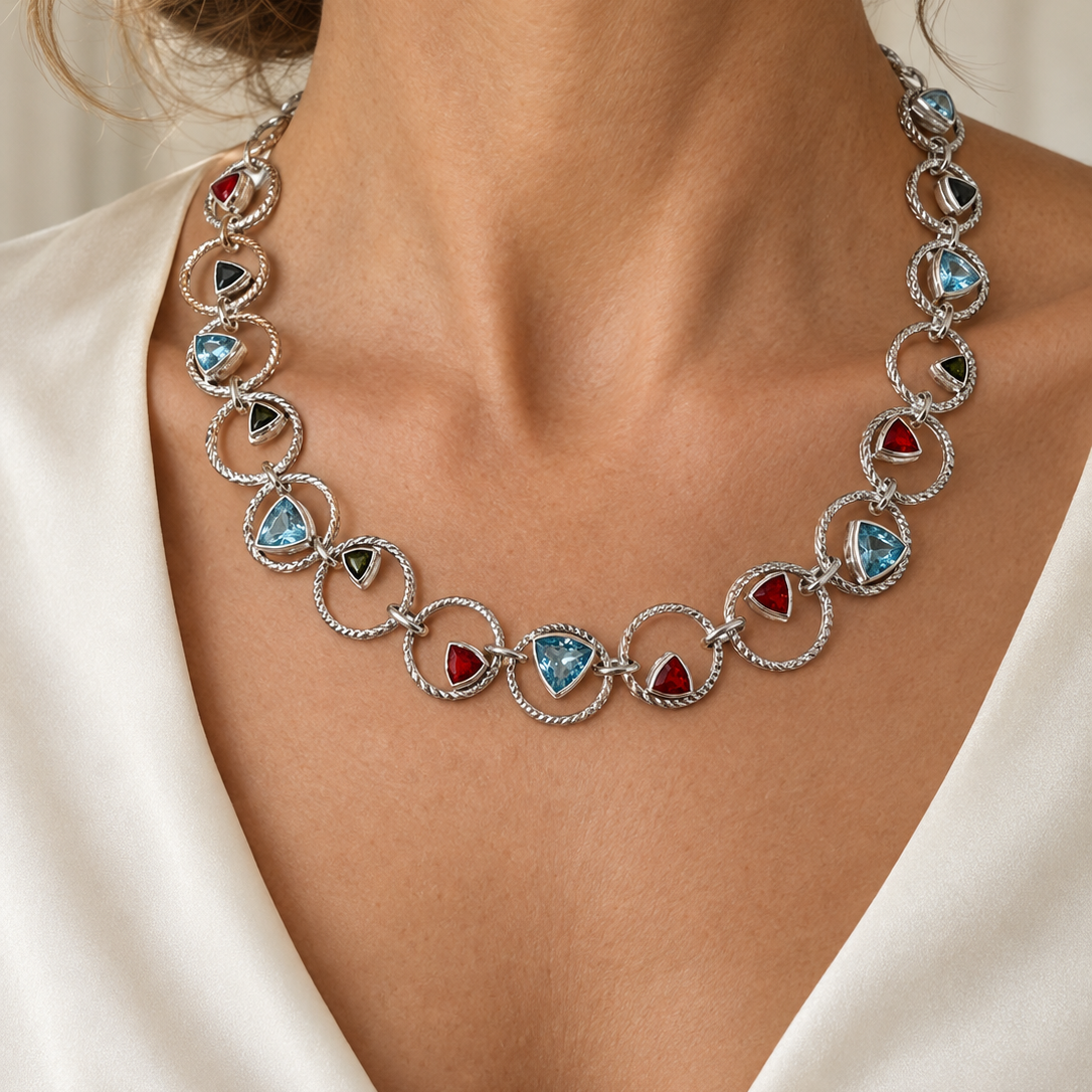 Woman wearing the Lesunja Sepia Silver Necklace Blue Topaz, Fire Opal & Tourmaline