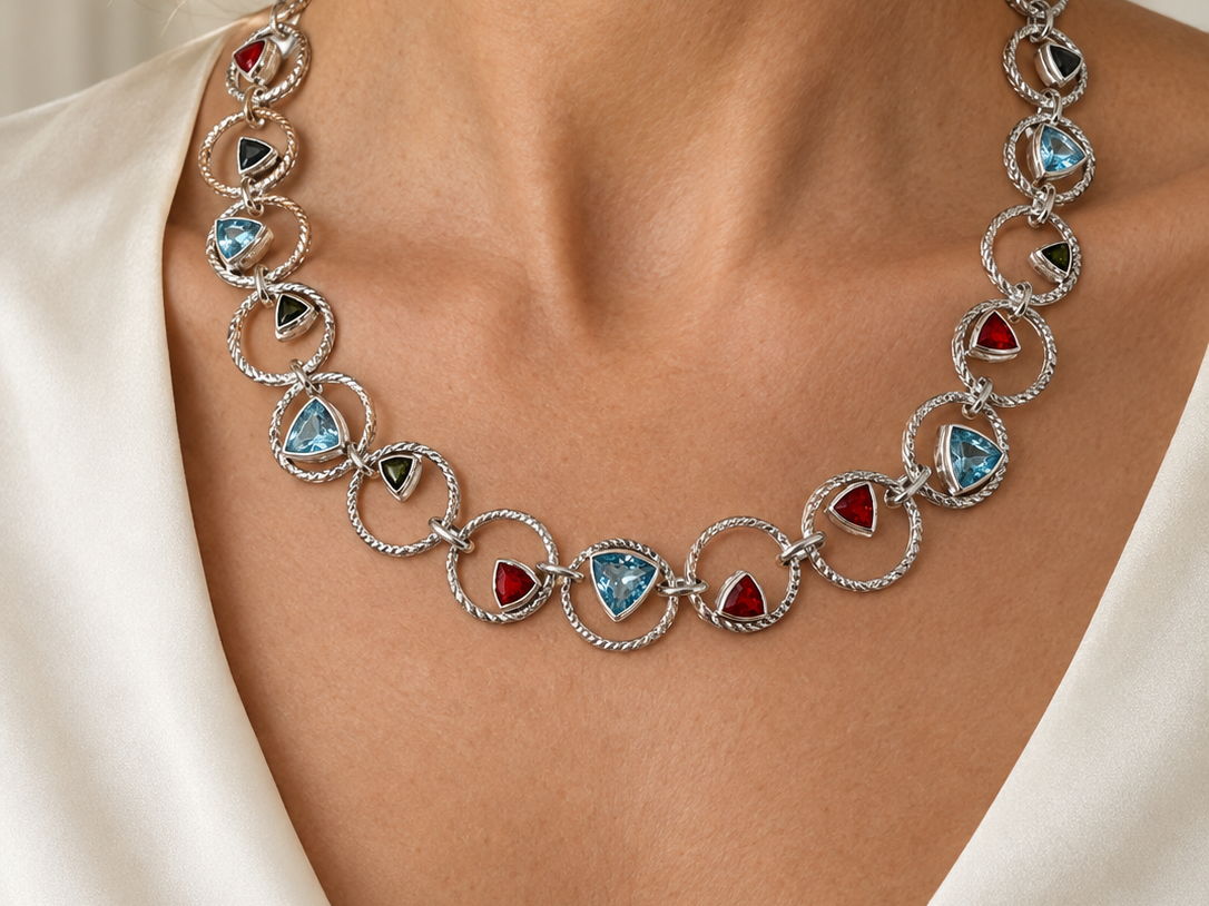 Woman wearing the Lesunja Sepia Silver Necklace Blue Topaz, Fire Opal & Tourmaline