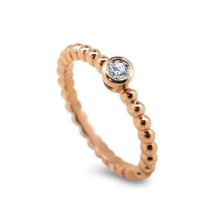 rose gold solitaire diamond ring