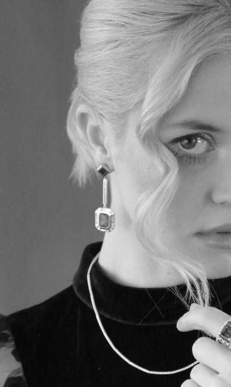 emerald platinum earrings price