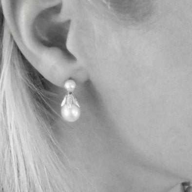 pearl ear studs gold